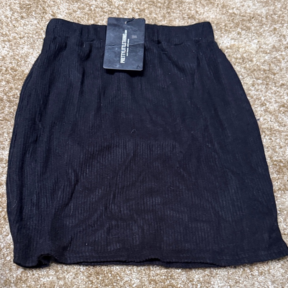 PrettyLittleThing Black Ribbed Mini Skirt